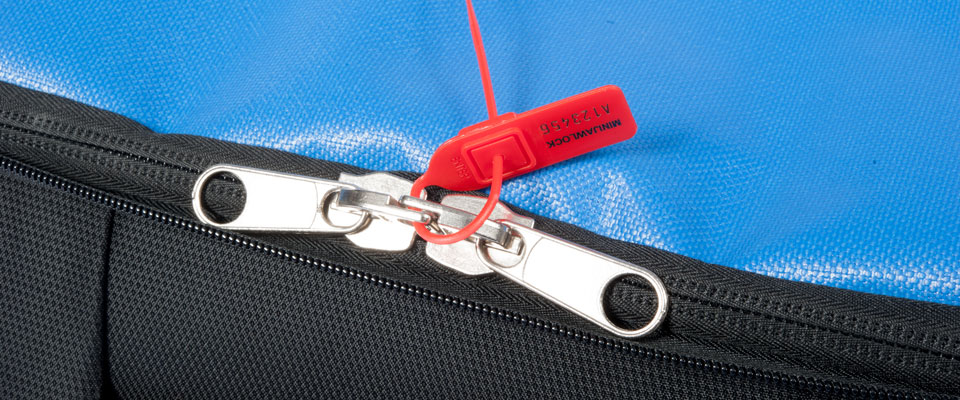 Unzipping the main compartment open reveals a security enclosure, complete with pull-tight seal compatibility. We can optionally fit ZipLock enclosures at the factory for compatibility with our economical ZipLock security seals.