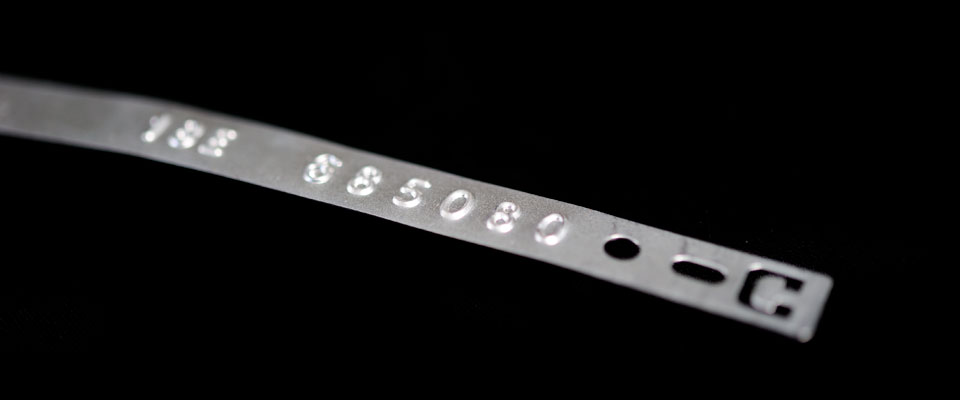 Serial numbers are stamped into the metal for excellent readability and tamper resistance.